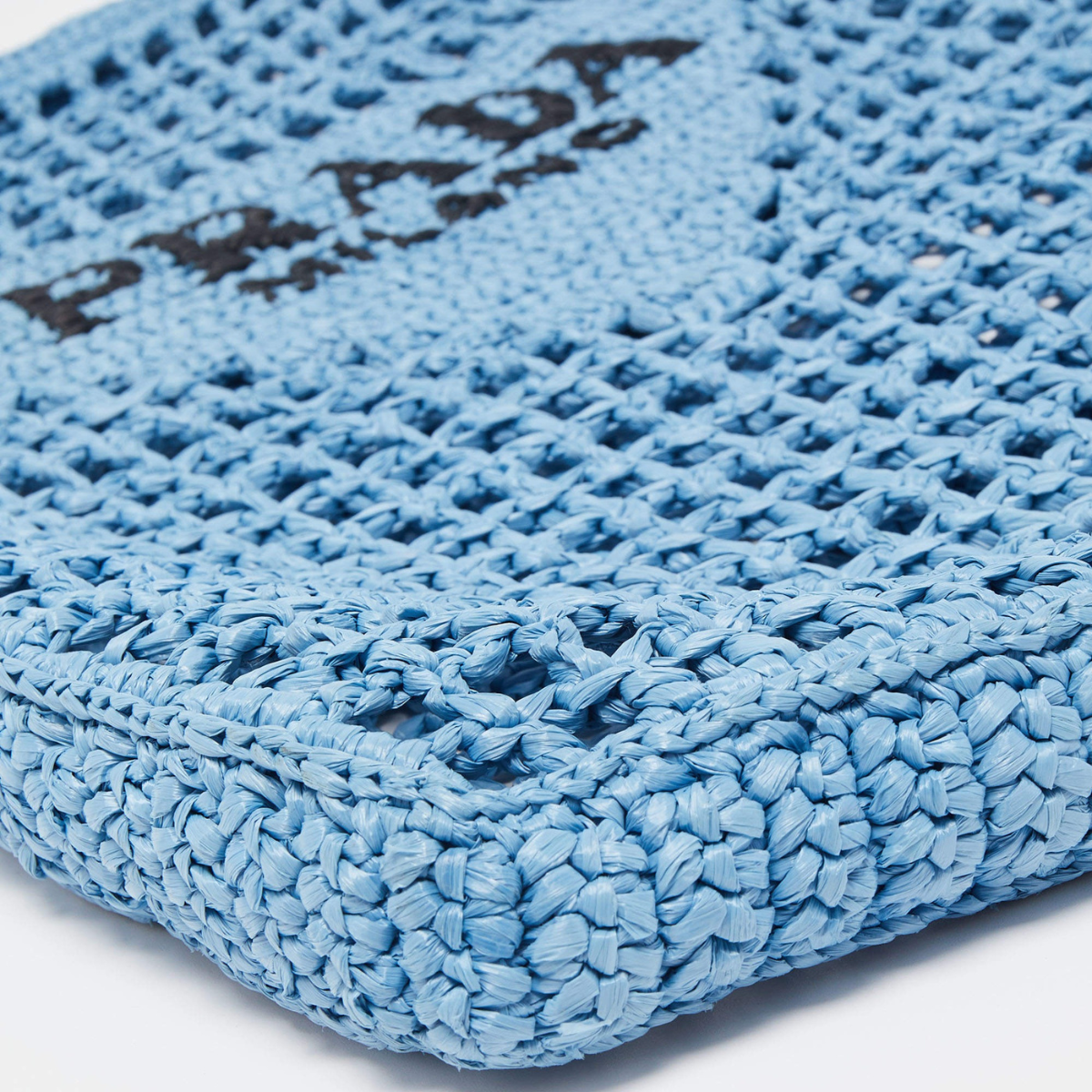 PRADA SHOPPER BAG IN RAFFIA WITH WOVEN LOGO – BLUE